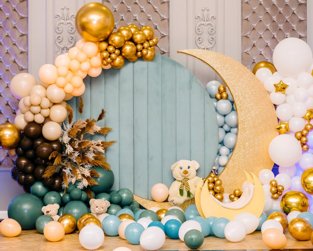 Happy Birthday! Close up Children's decoration  different color of balloonsand cradle Decorated photo zone. Festive decorative elements, photo area